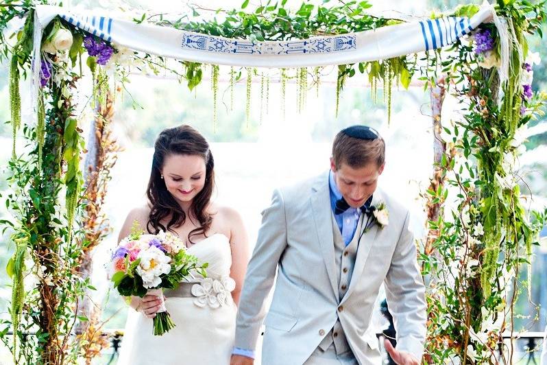 Newlyweds under arch