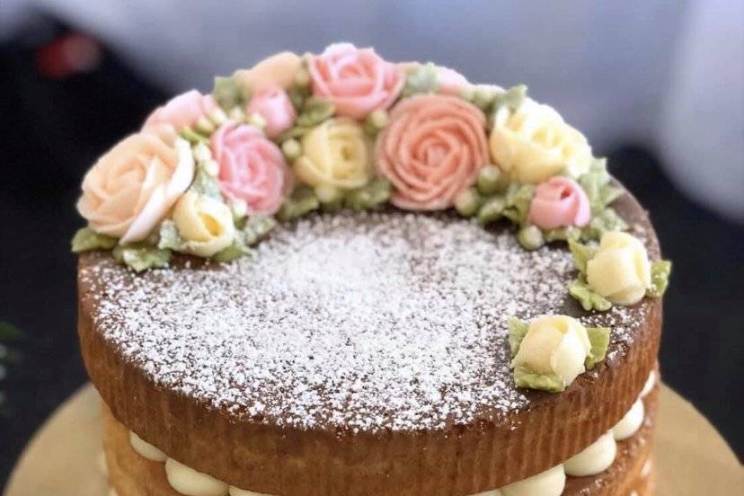 Layered naked cake with floral decor