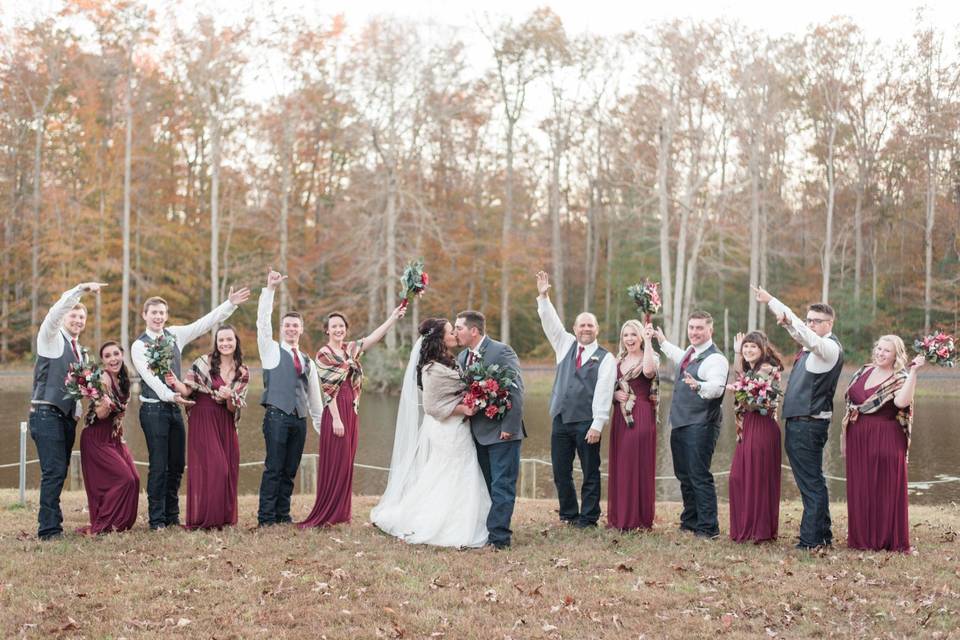 Newlyweds with wedding party