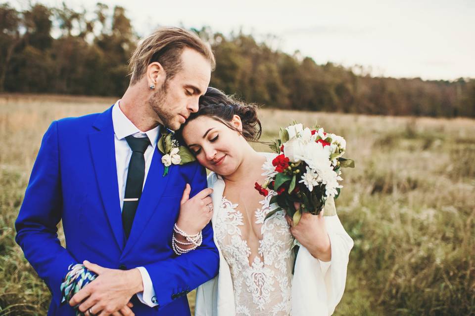 Couple standing in a field