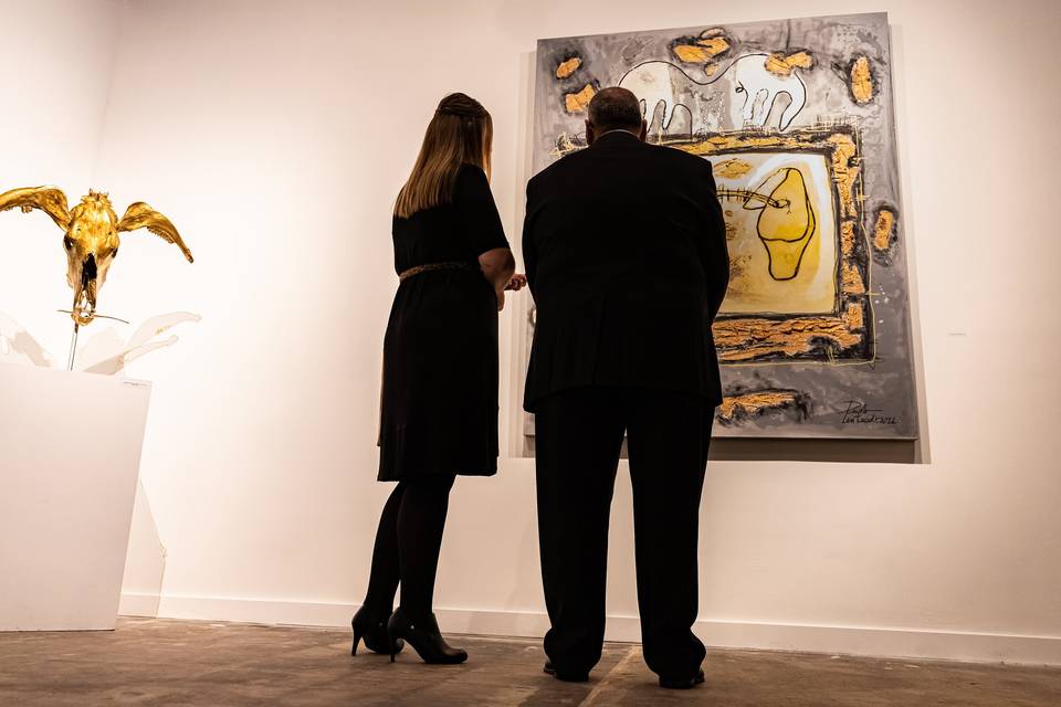 Couple admiring art piece