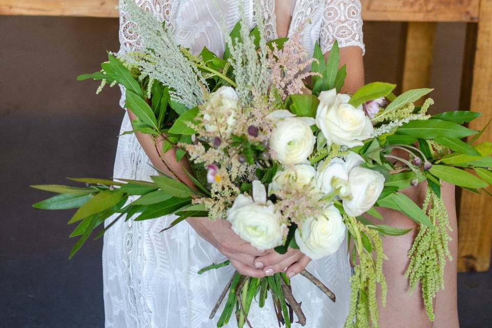 Soft greens and white roses