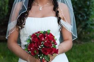 Finished look for the bride. Makeup, hairstyle, and hair piece with jewels placed on by A. Collins.