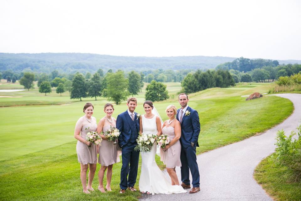 Couple with their bridal party