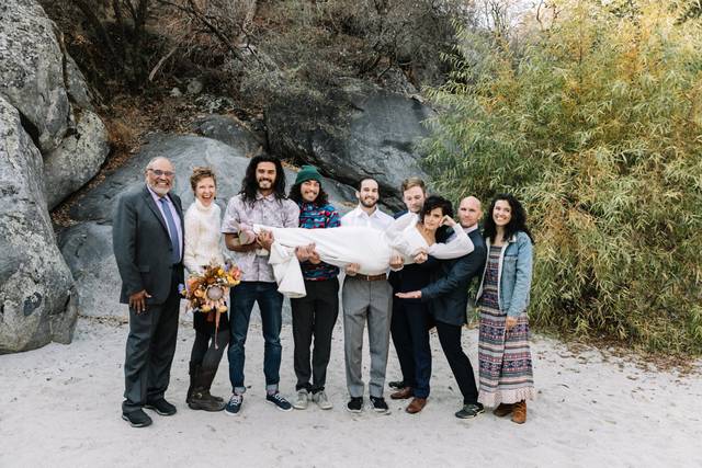 Family Holding Bride