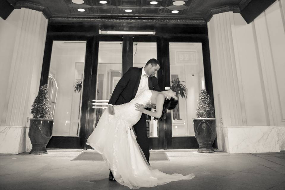 Bride and groom outside the hotel