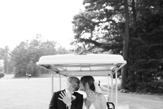 Couple on golf cart