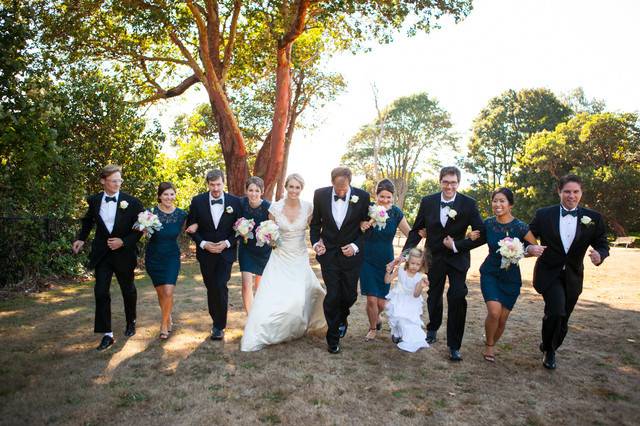The couple with the bridesmaids and groomsmen