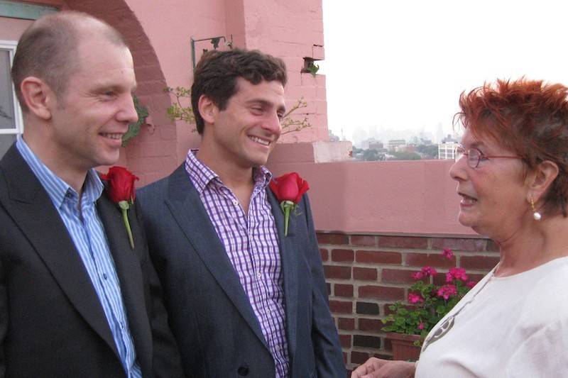 Officiant and the newlyweds