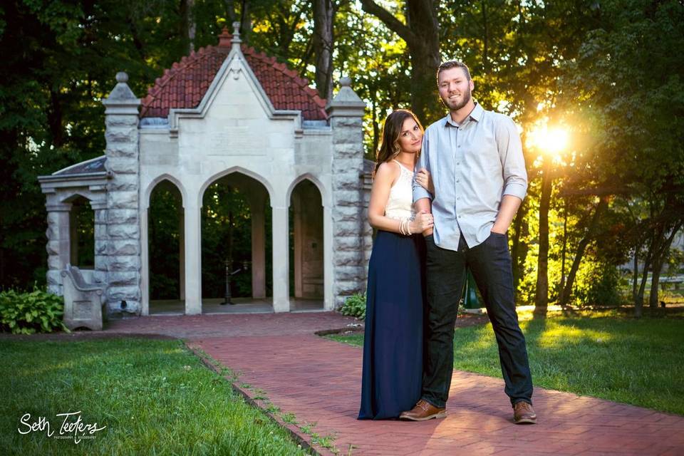 Engagement session portrait taken at the Rose Well House on IU campus.