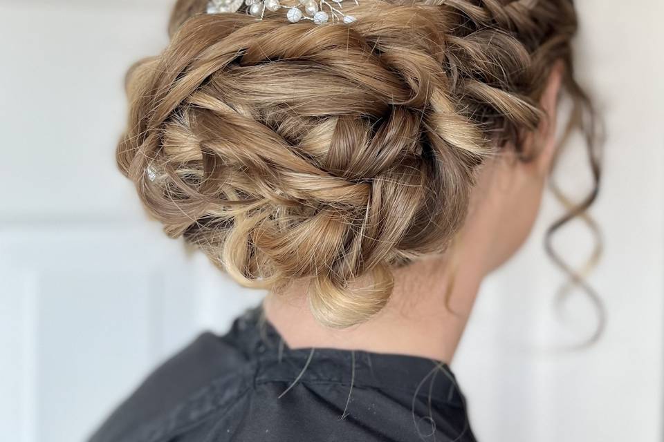 Side braid into twisted updo