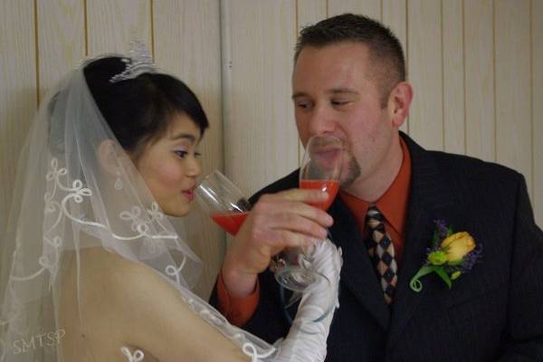 Taking their first drink as a married couple is very special!