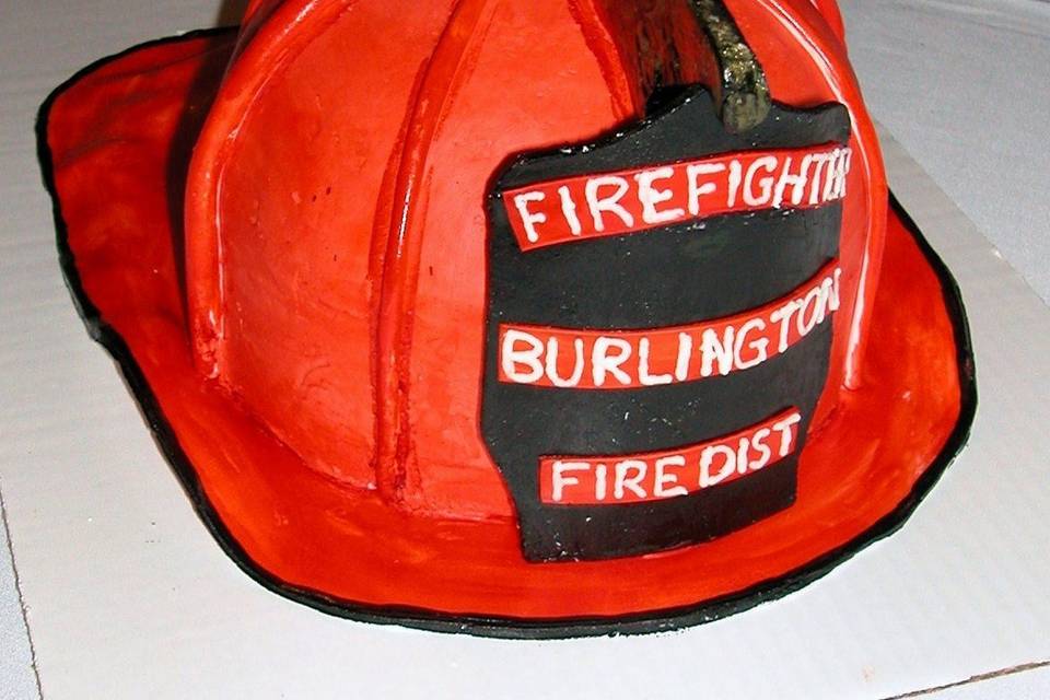 Italian Buttercream Fire Helmet deorated with fondant