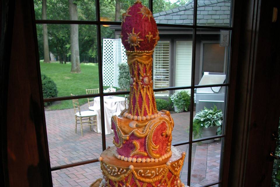 Carved, Russian themed, Italian Buttercream wedding cake decorated with handmade sugar work.