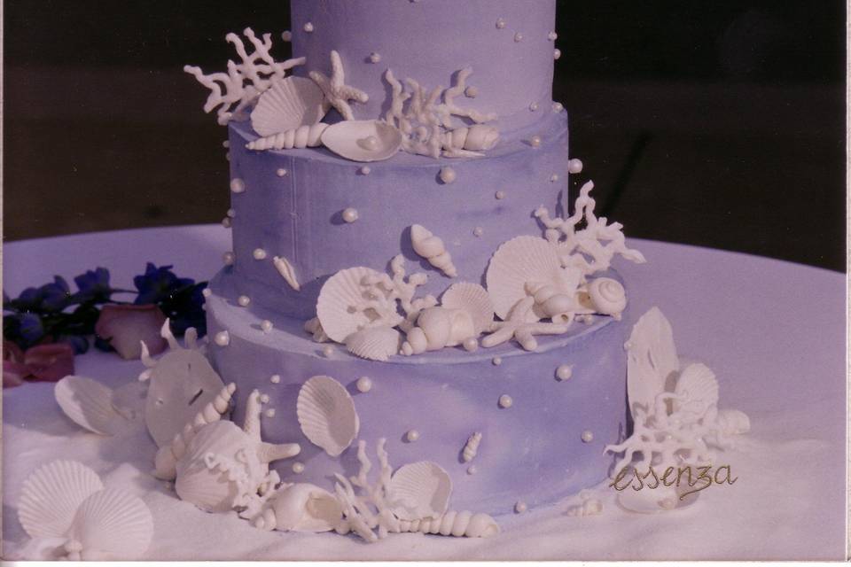 Custom Handmade Sugar Seashells decorate this Italian Buttercream wedding cake