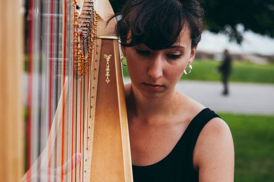 Molly Madden, performing at an outdoor wedding.