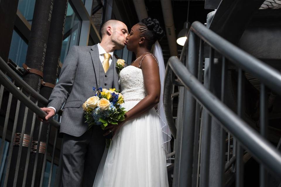 Stairway Scene of Bride and Groom