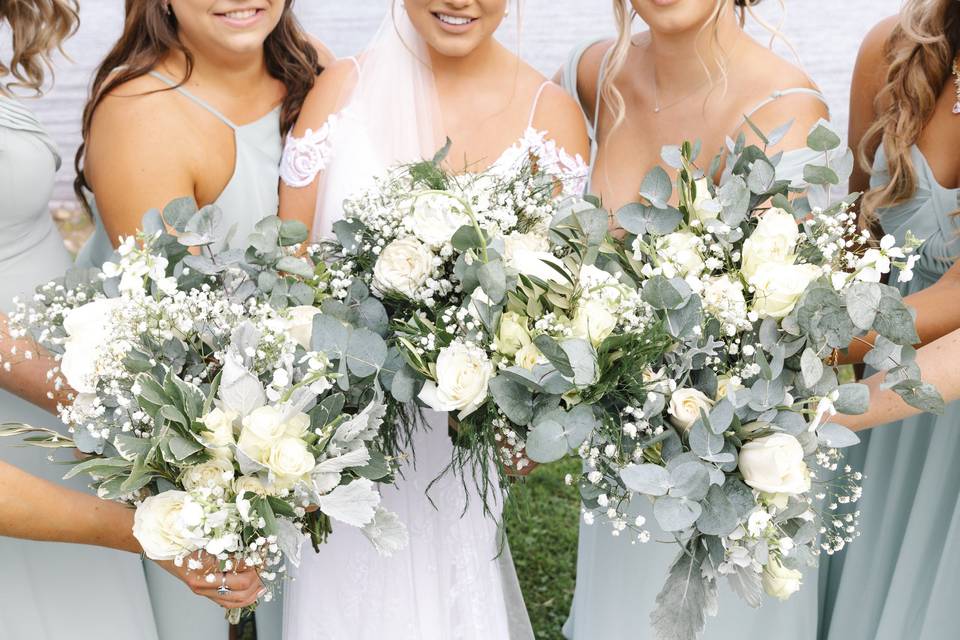 Holding their bouquets