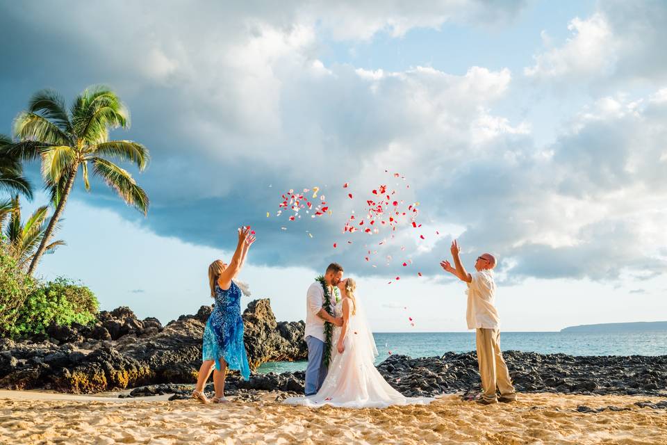 Family make a wish for couple