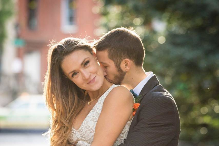 Kisses by the groom