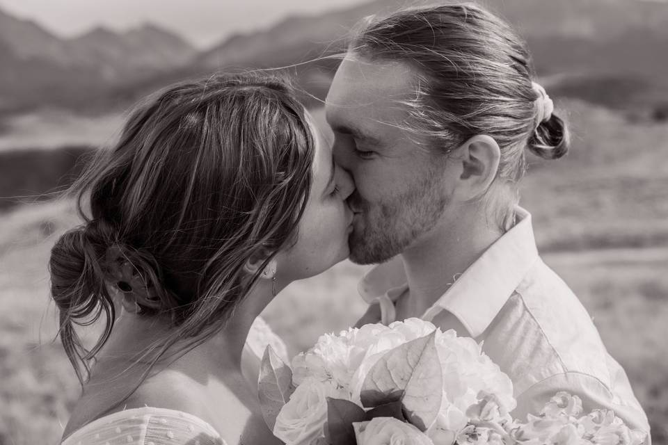 Bride and Groom kissing b&W