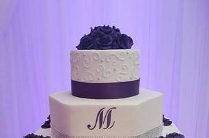 All buttercream frosting, flowers and monogram with bling and quillting.