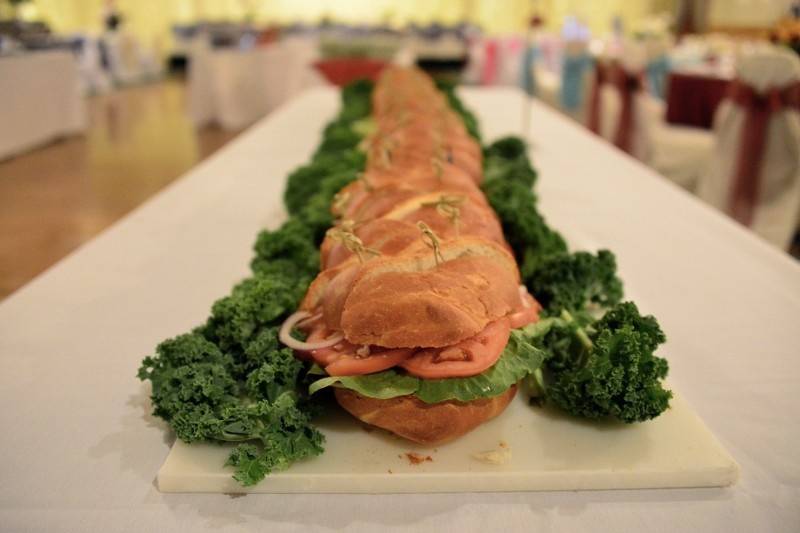 Treat your guests to a 6 foot sub, from our 10 o'clock menu.
Photo courtesy of Rachel Napear Photography.