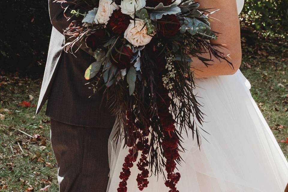 A happy couple with bouquet