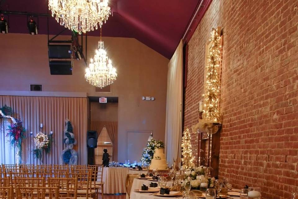 Tables placed along the wall during ceremony.